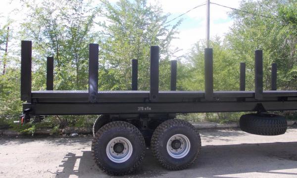 Прицеп-сортиментовоз САРМАТ 46106 для перевозки штучных длинномерных грузов Прицеп-сортиментовоз САРМАТ 46106 для перевозки штучных длинномерных грузов